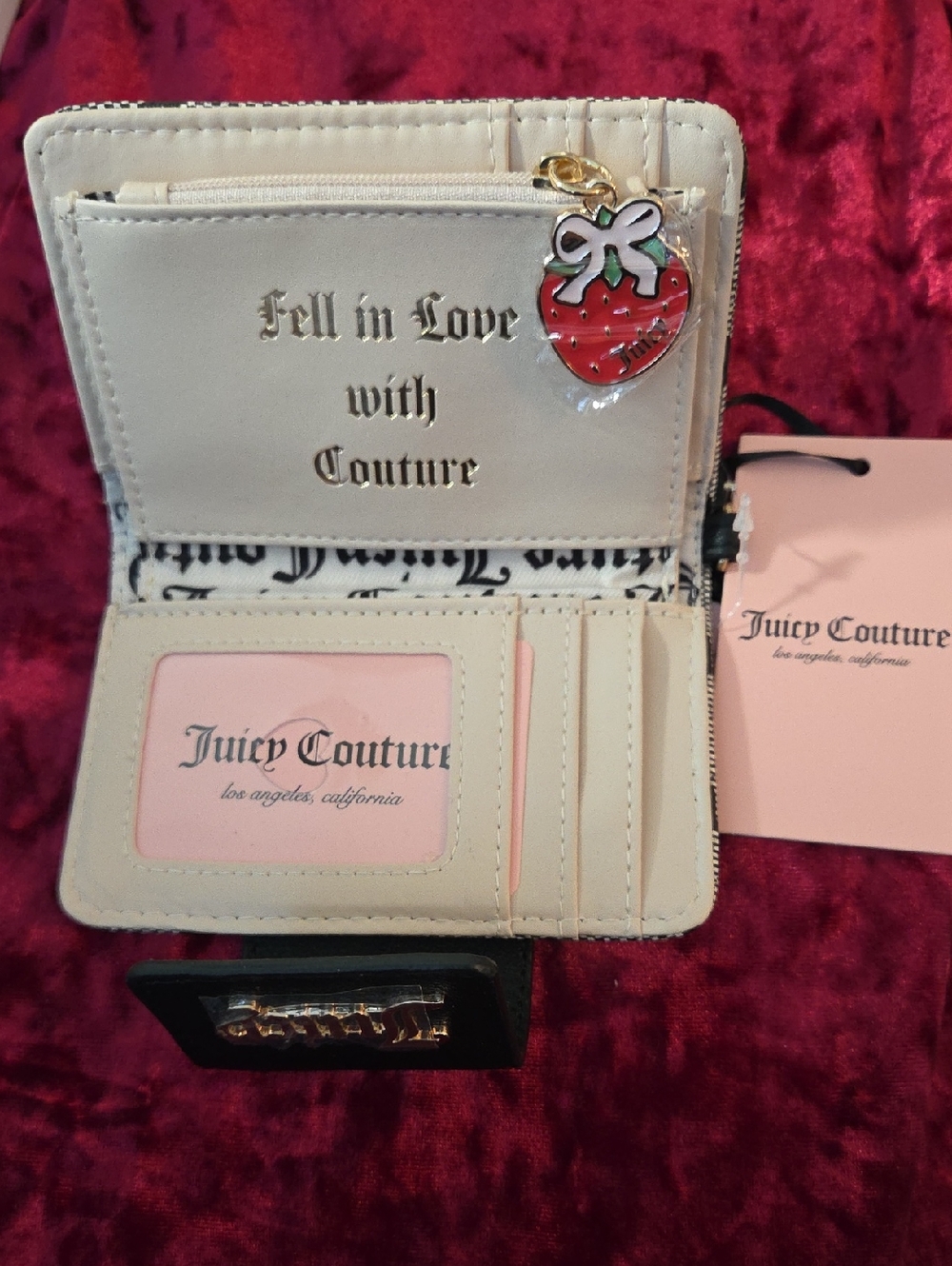Juicy Couture cream and black compact wallet with strawberry charm